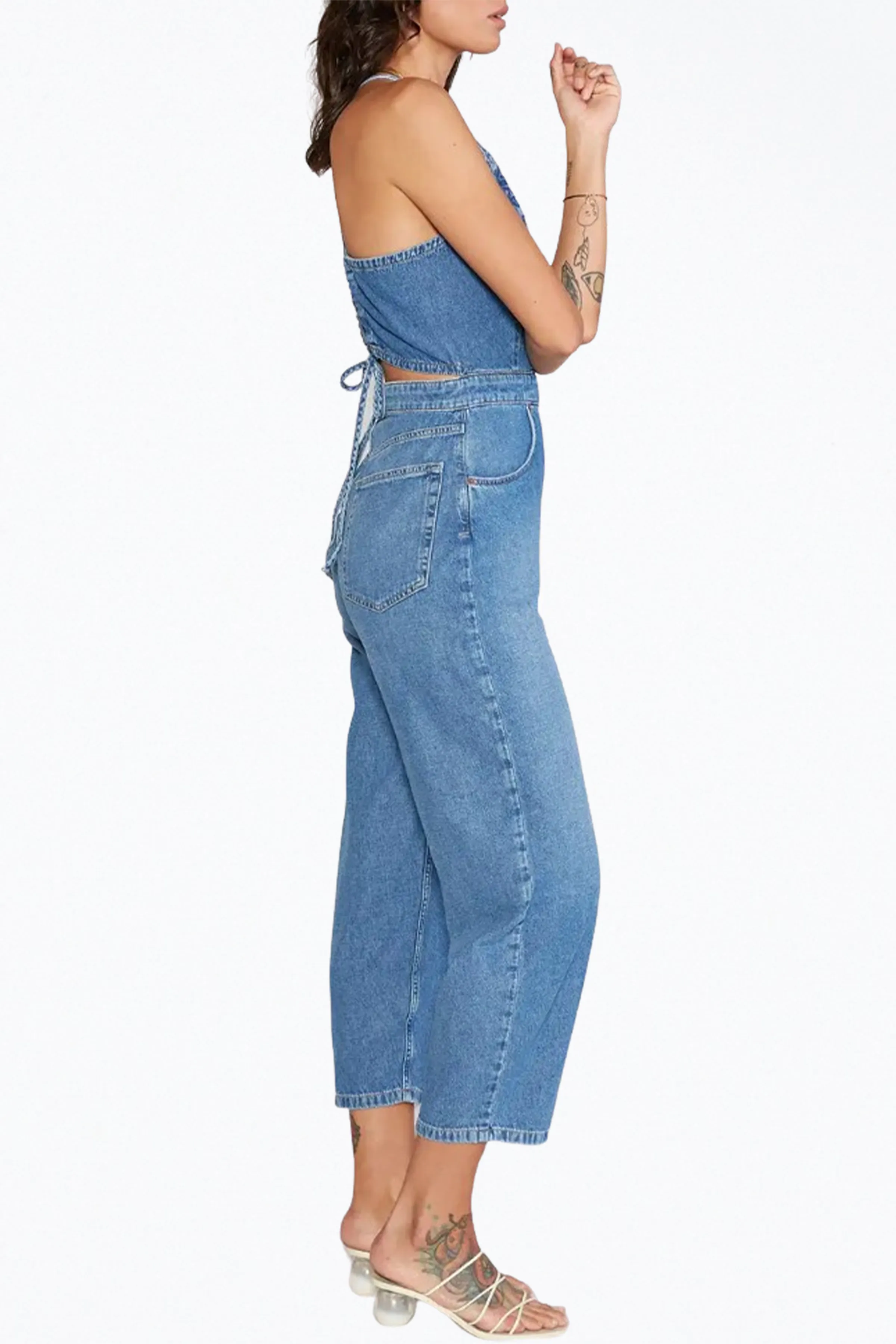 BIRDIE HALTERNECK WRAP-EFFECT OPEN-BACK CHAMBRAY JUMPSUIT